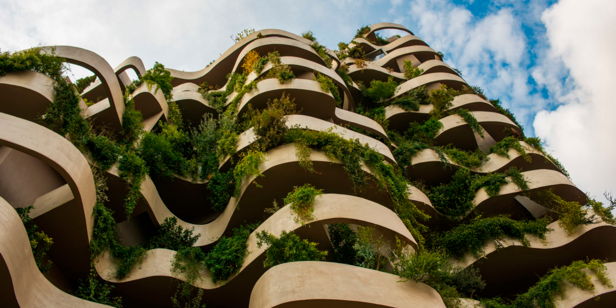 Luxury eco-friendly home in Spain with sustainable architecture, bioconstruction materials, and natural surroundings.