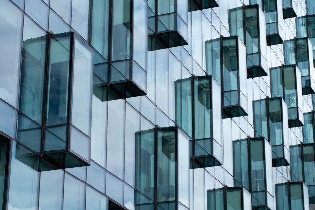 Modern building with glass cubicle balconies