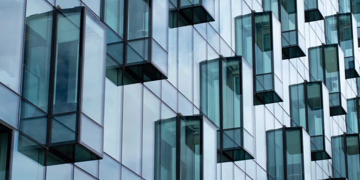 Modern building with glass cubicle balconies