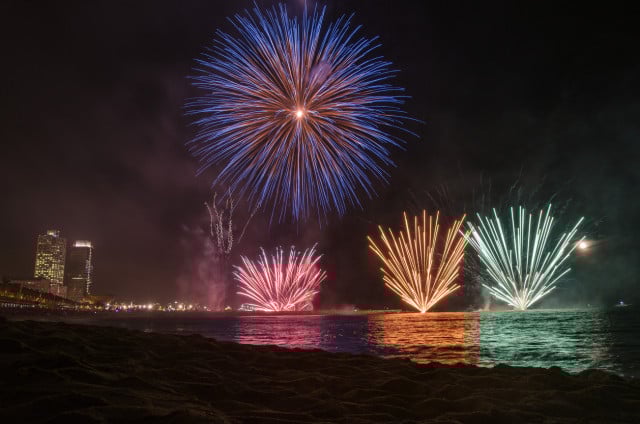 Fireworks, beach, sea, building