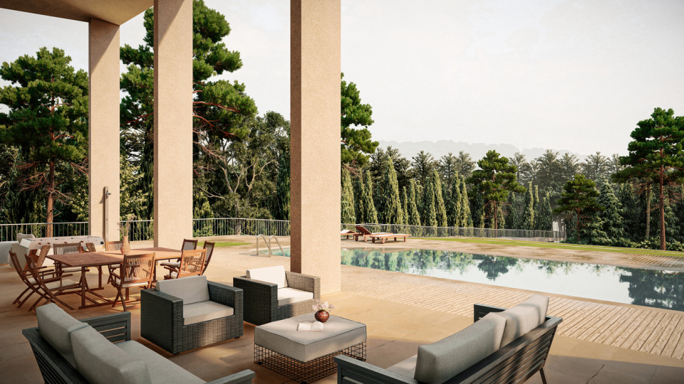 Luxury property with beautifully integrated indoor and outdoor spaces, surrounded by greenery and furnished with elegant, high-end furniture.