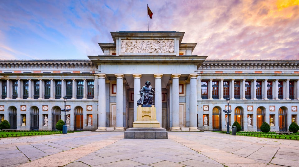 Beautiful front view of the prado museum in Madrid with a beautiful sunset.