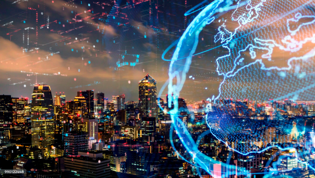 A vibrant city skyline at night illuminated by skyscrapers and digital overlays of a glowing Earth globe and data streams, symbolizing global connectivity and smart city technology.