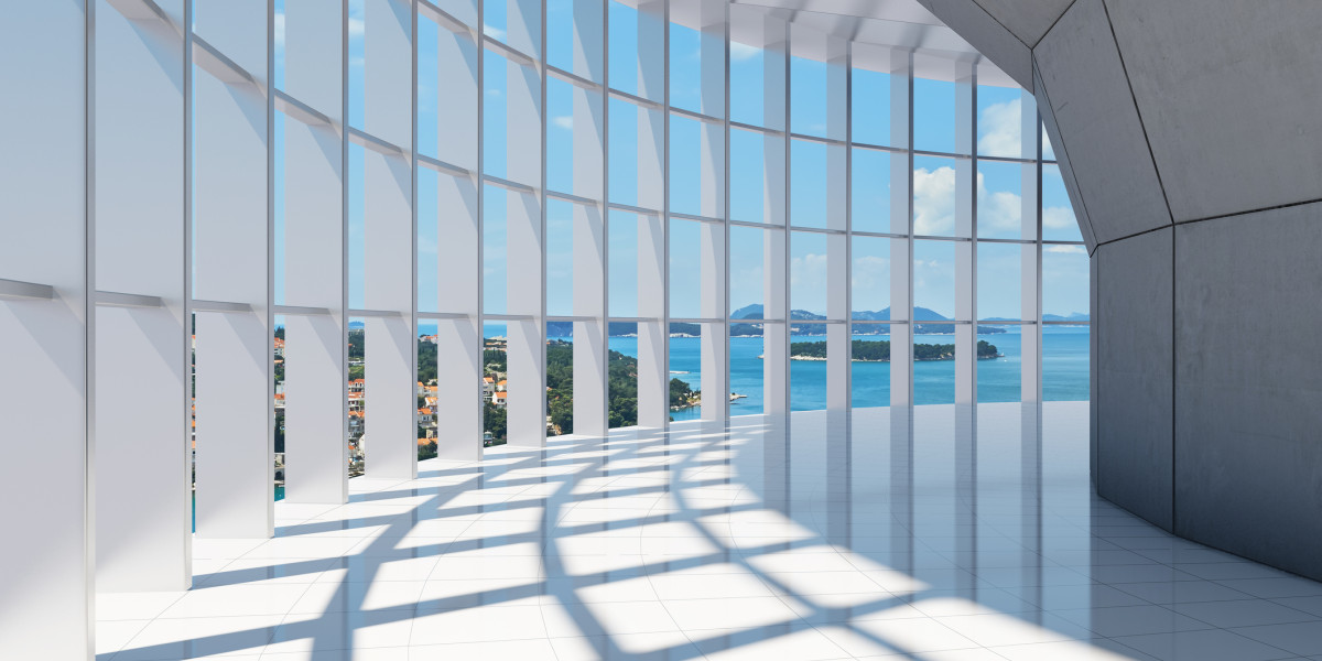 Modern building with a beautiful glass walkway overlooking the sea.